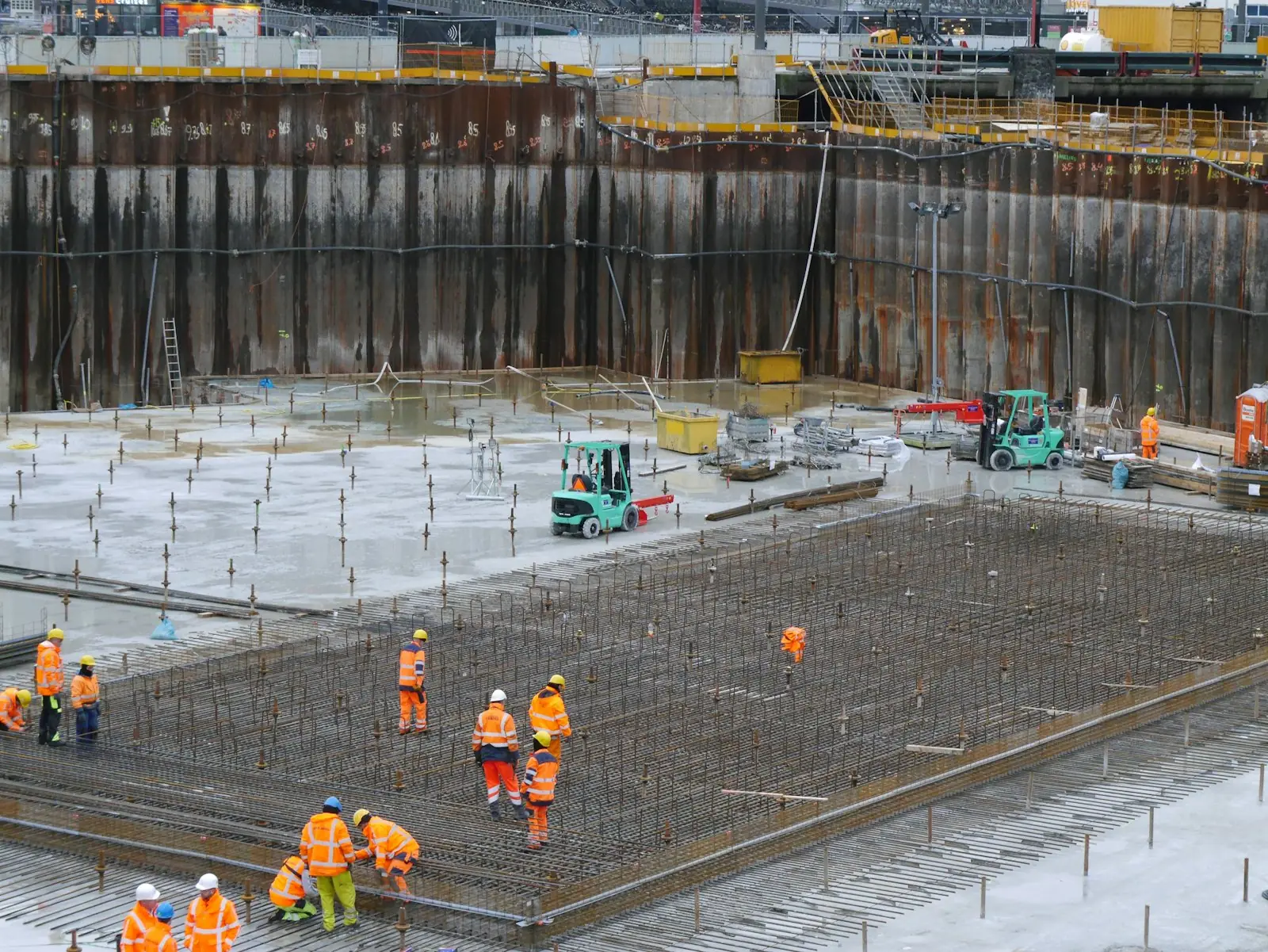 A construction crew gathered at a job site